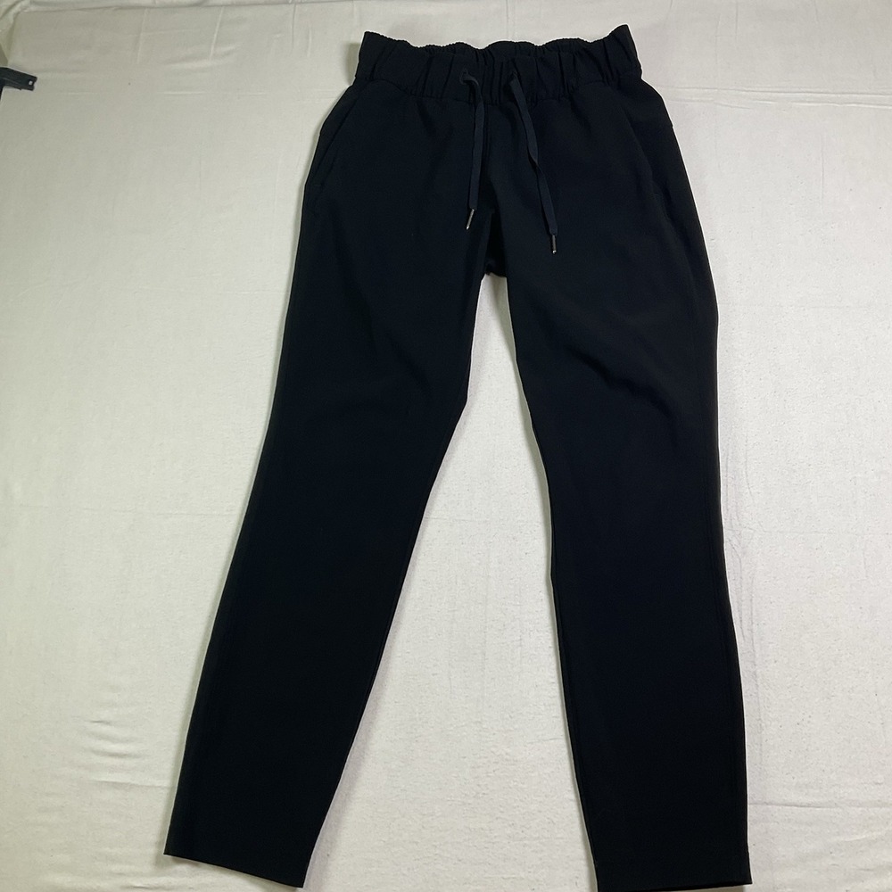 Lululemon On the Fly 7/8 Pant Woman's Sz 2 Black Luxtreme Drawstring Travel 644